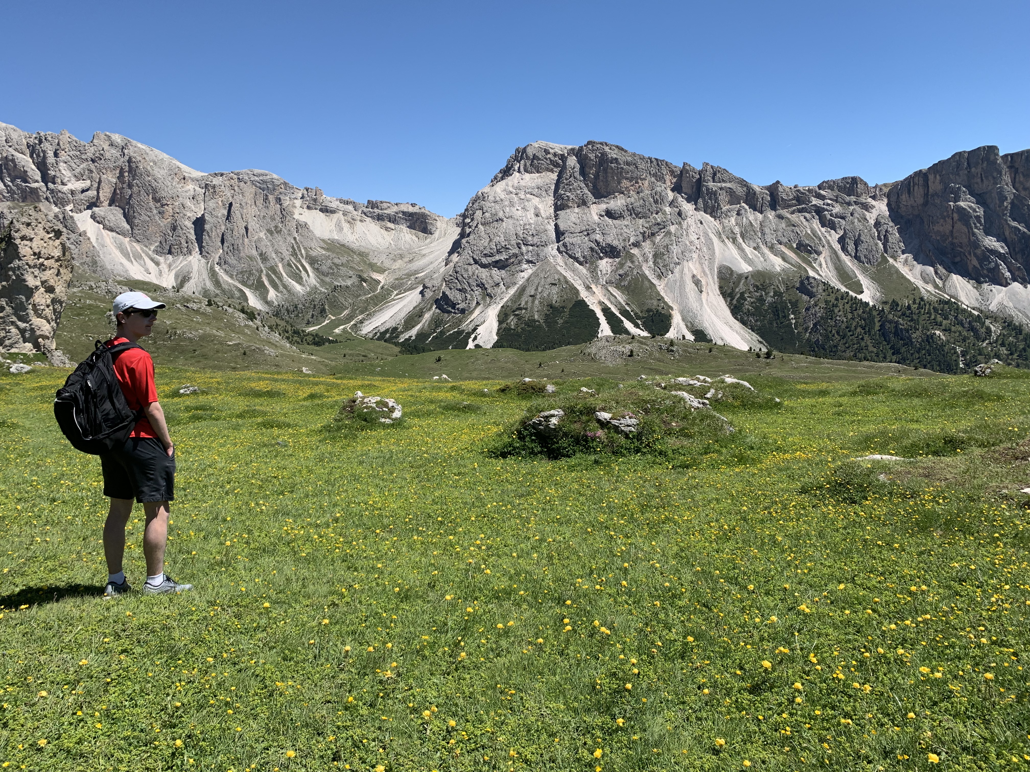 man looking at mountains